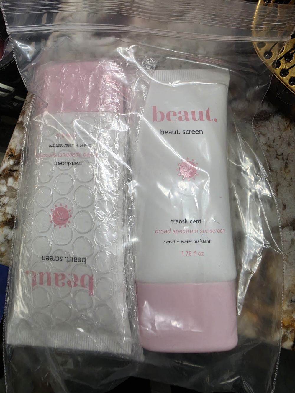 NEW!  X 2 beaut. translucent broad spectrum sunscreen — pink & white tube